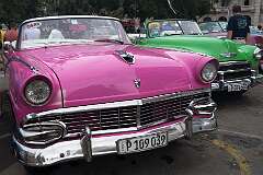 A 1956 Ford Fairlane and 1951 Chevrolet Skyline, convertibles in Havana, Cuba, two well preserved vintage American cabriolets.