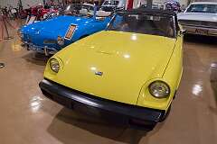 A Jensen Healey (1972–1976) and behind it a 1962 Volkswagen Karmann Ghia.