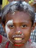 Omarakana, Kiriwina, Papua New Guinea, 2005 - A boy at an Osimoya dance in the Trobriand Islands.