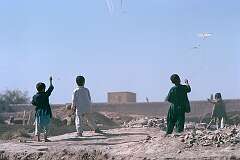 Young boys of Herat are flying their home-made kites, an everyday sight in Afghanistan, until the Taliban regime apparently forbade it. But that finished with its overthrow.