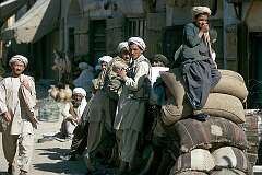 Porters with their ropes, ready to haul heavy loads. There are always groups of men and boys, ready to work if required.