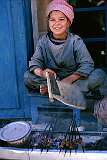 Kebab, meat roasted on skewers and grilled over hot coals, is something of a national dish and could be bought from, often very young, sellers like here in Mazar-e-Sharif.