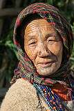 Radhe Khokhung Tachi, an Apatani woman with traditional “yaping hurlo” nose plugs and tattoo in Tajang. This practice is now banned by the Indian government.