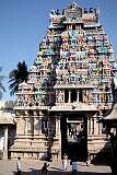 One of the richly carved “gopuram” or tower gateway on the northern side of the Sri Rangathaswamy Temple in Srirangam. The temple was first built by the Chola ruler, Dharmavarma. The Kaveri river flood destroyed the temple vimanam, and later, the early Cholas King Killivalavan rebuilt the temple complex that is present today.