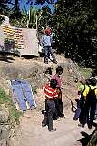 Boys shooting at balloons along Coaker's Walk, a scenic walk in the hill town of Kodaikanal.