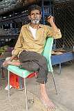 A shopkeeper at the Mir Alam Mandi Vegetable Market along Mir Chowk Road in Pathar Gatti.