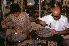 Two silversmiths in Isfahan's bazaar.