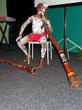 Cairns, Queensland, Australia, 2006 - An Aboriginal boy playing the didjeridu.