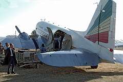 Loading a Douglas DC3 of Ethiopian Airways on the grass airstrip in Bahir Dar, Ethiopia, in 1973.
