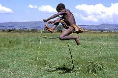Eswatini, Lobamba, 1972 - A Swazi boy doing high jumps.