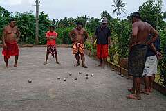 Tufu'one, Uvea, Wallis & Futuna, 2013 - Wallisian men play the French game of petanque.