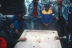 Darjeeling, West Bengal, India, 1979 - Playing a game on the street.