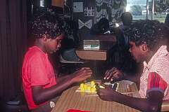 Borroloola, NT, Australia, 1981 - Yanyuwa boys playing draughts with Lego blocks in class.