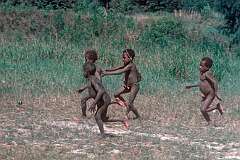 Madi, Paniai, Papua, Indonesia, 1979 - Ekari boys playing football, near Enarotali.